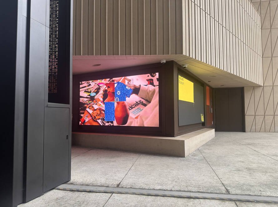 An urban raw pic of V&A with art and  a football shirt